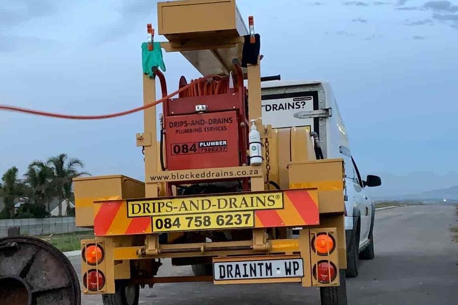 Drips-and-Drains trailer-mounted hydro-jetting machine